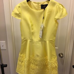 Bright yellow embroidered dress